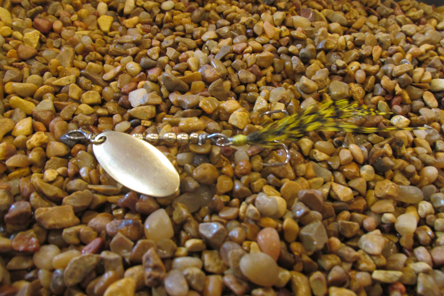 Yellow Grizzly Hackle Brass Swing Blade